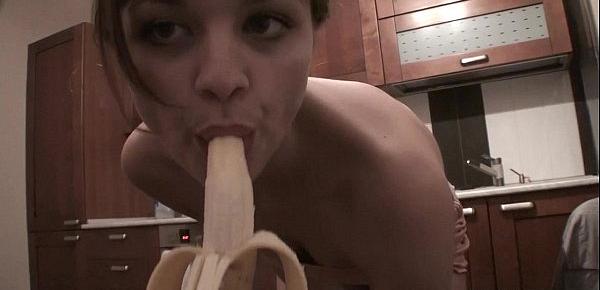  Freckled-face baby plays with her dildo on kitchen counter